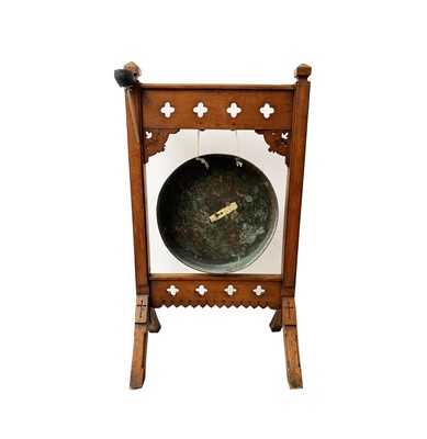 Lot 3246 - An Arts and Crafts oak dinner gong. height...