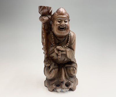 Lot 279 - A Chinese carved hardwood figural lamp base,...