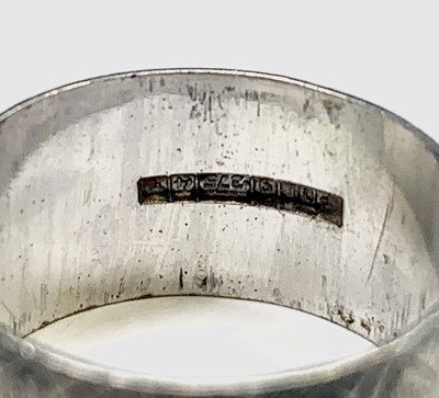 Lot 398 - A 9ct rose gold engraved band Birmingham 1918...
