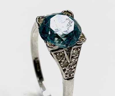 Lot 150 - A platinum ring set an aquamarine of...