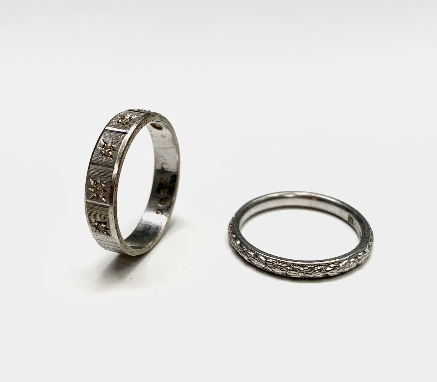 Lot 96 - A platinum band 3.8gm and an 18ct white gold...