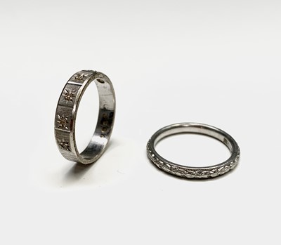 Lot 96 - A platinum band 3.8gm and an 18ct white gold...