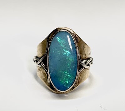 Lot 48 - A craft gold and silver ring set an opal 12.6gm