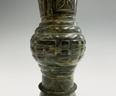 Lot 290 - A Chinese archaic style bronze gu vase,...