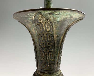 Lot 290 - A Chinese archaic style bronze gu vase,...