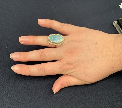 Lot 204 - An impressive 18ct (unmarked) gold oval opal...