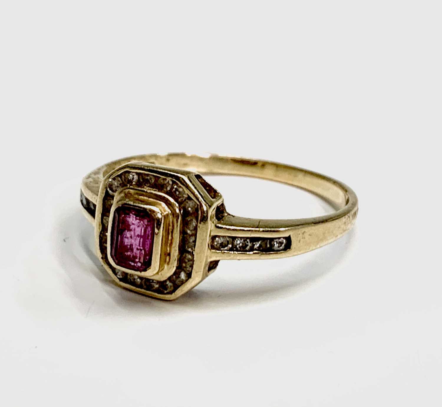 Lot 248 - An 18ct gold ruby and diamond square cluster...