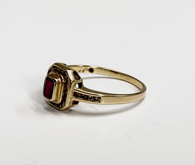 Lot 248 - An 18ct gold ruby and diamond square cluster...