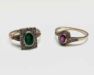 Lot 127 - Two 9ct gold ring, one set with an emerald and...