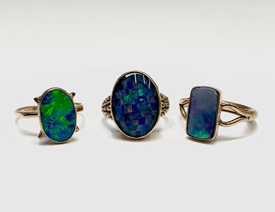 Lot 392 - Three opal set gold rings 12.1gm