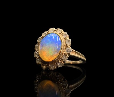 Lot 183 - An opal and white stone cluster 10ct gold ring...