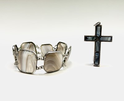Lot 412 - A silver bracelet with 7 panels of grey/white...