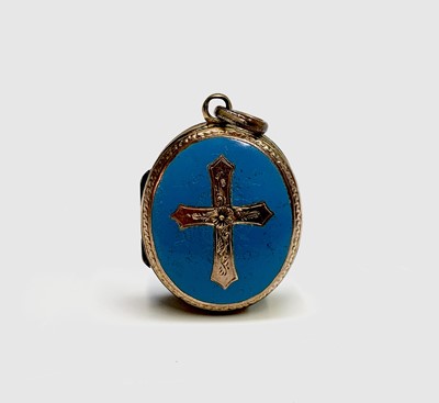 Lot 319 - An engraved gold locket with a cross on blue...