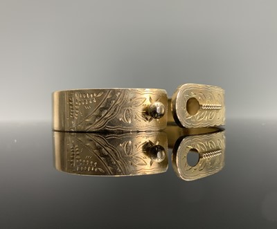 Lot 118 - A Victorian silver-gilt, engraved, hinged...