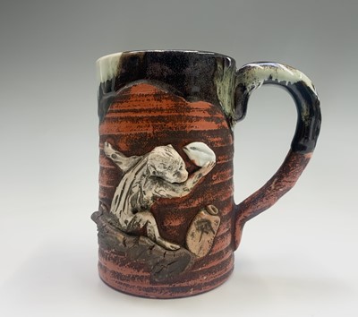 Lot 295 - A Japanese Sumida Gawa pottery mug, 19th...