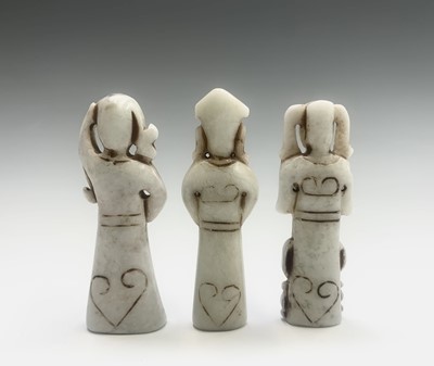 Lot 301 - Three Chinese carved greenstone figures, of...