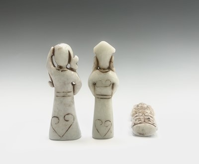 Lot 301 - Three Chinese carved greenstone figures, of...