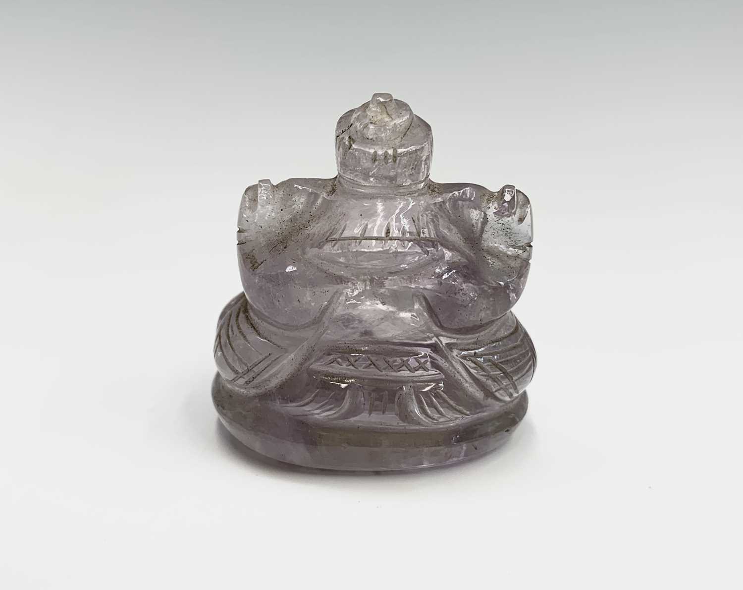 Lot 1072 - An Indian rock crystal amulet of Ganesh,...