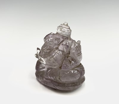 Lot 1072 - An Indian rock crystal amulet of Ganesh,...