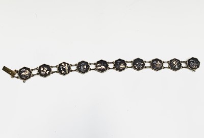 Lot 304 - A Japanese damascene bracelet, comprising ten...