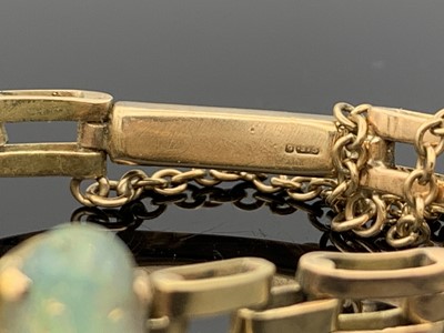 Lot 375 - A 9ct gold bracelet set with seven graduated...