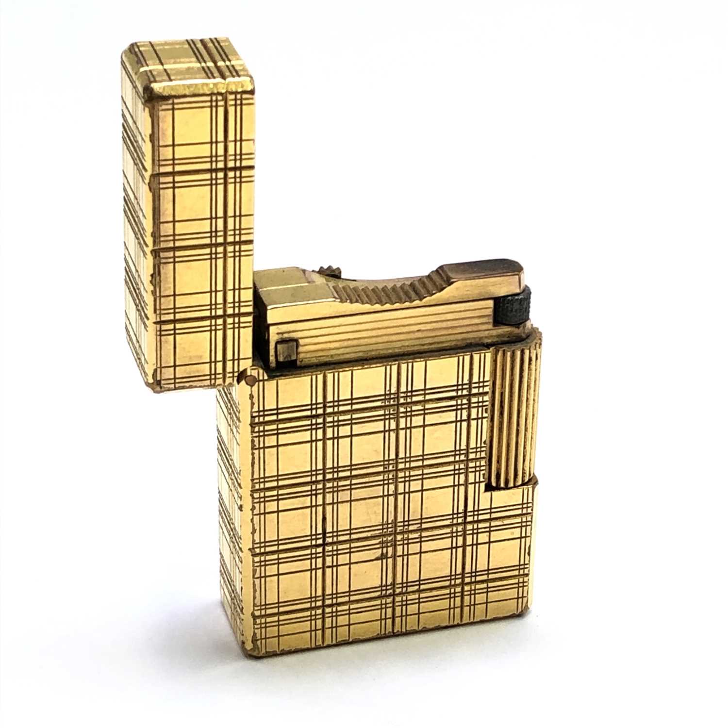 Lot 2544 - A Dupont Hermes gold plated gas cigarette...