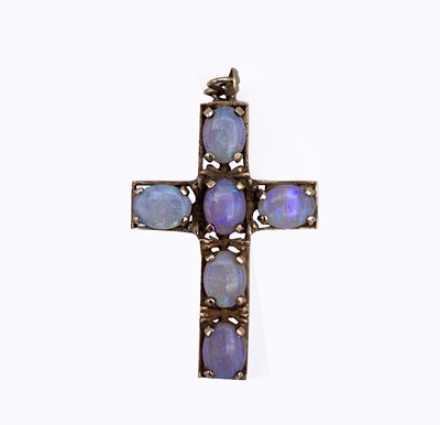 Lot 95 - A 9ct gold cross set with six opals 39mm 5.3gm
