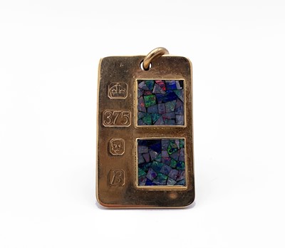 Lot 4 - A 9ct gold ingot pendant mounted with two opal...