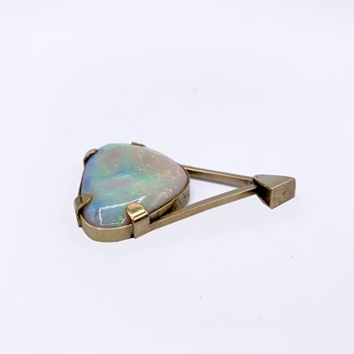 Lot 210 - A large triangular opal mounted in 9ct gold by...