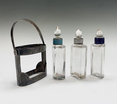 Lot 1065 - An early George VI perfume set with three cut...