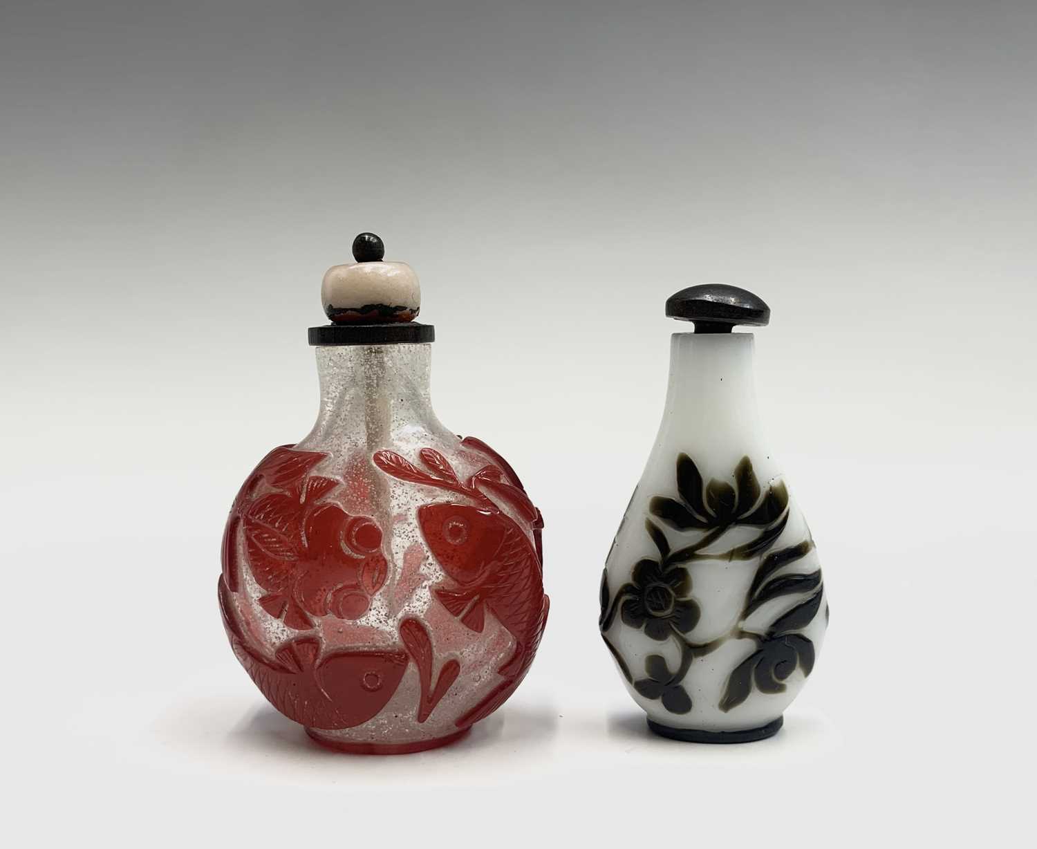 Lot 358 - Two Chinese glass scent bottles. Height 8cm...