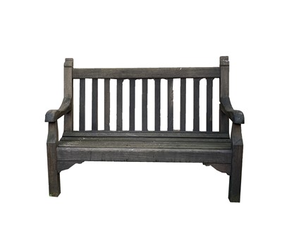 Lot 613 - A wooden garden bench. Height 99cm, width...