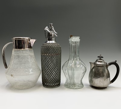 Lot 357 - A large crackle glass carafe, with plated...