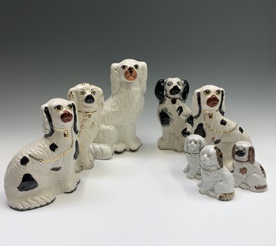 Lot 1070 - A late Victorian Staffordshire pottery spaniel,...