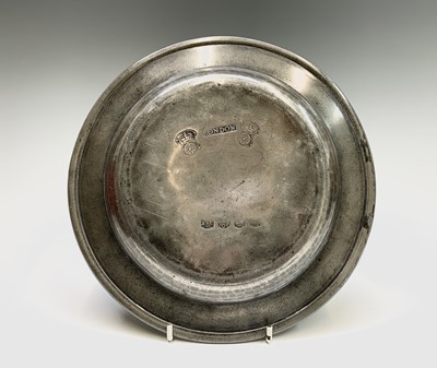 Lot 359 - A 19th century pewter plate, London touchmarks,...