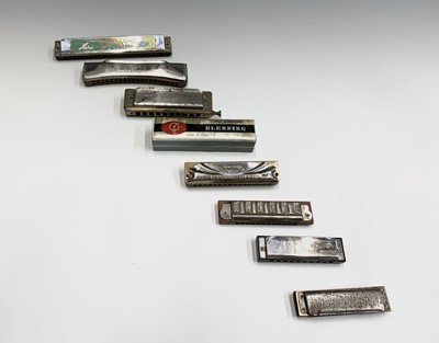 Lot 366 - Two Hohner harmonicas and six others (8).