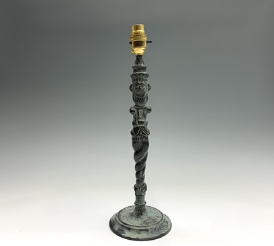 Lot 373 - An unusual bronze table lamp, circa 1920, cast...