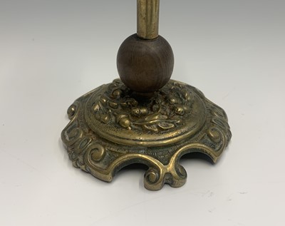 Lot 381 - A pair of 19th century brass candlesticks,...