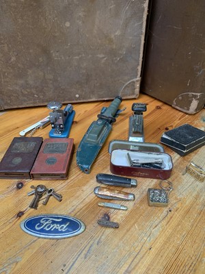 Lot 25 - A cased knife, two Llloyds bank savings tins,...