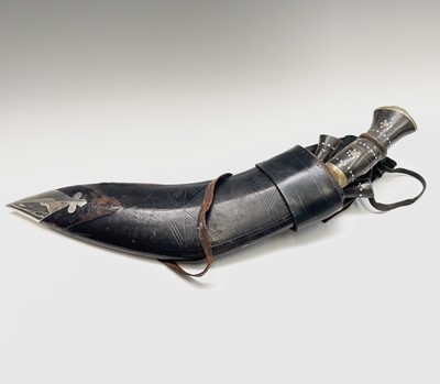 Lot 1031 - A 20th century Indian made Kukri, the curved...