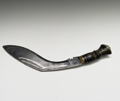 Lot 1031 - A 20th century Indian made Kukri, the curved...