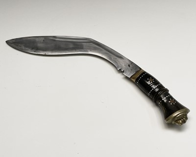 Lot 1031 - A 20th century Indian made Kukri, the curved...