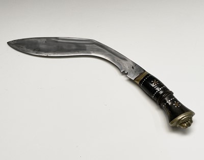 Lot 1031 - A 20th century Indian made Kukri, the curved...