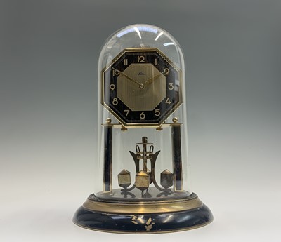 Lot 2909 - A German Art Deco brass and black enamel...