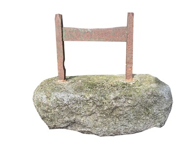 Lot 604 - An iron boot scraper set in a granite block....