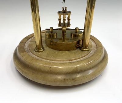 Lot 2919 - A rare German brass 400 day calendar torsion...