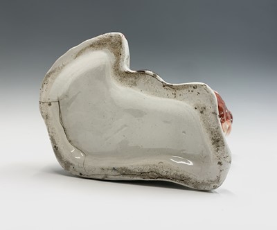 Lot 1091 - Two Victorian Staffordshire spaniel ornaments....