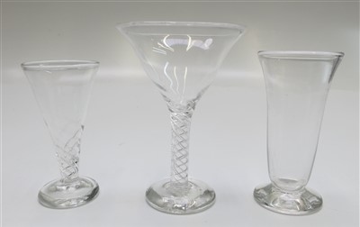 Lot 943 - A cocktail glass with an air twist stem,...