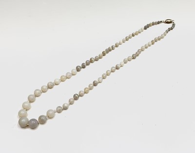 Lot 11 - An opal necklace of 71 graduated beads the...