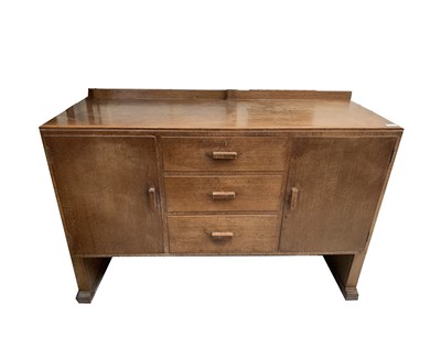 Lot 3241 - An Art Deco oak sideboard, with ledge back and...